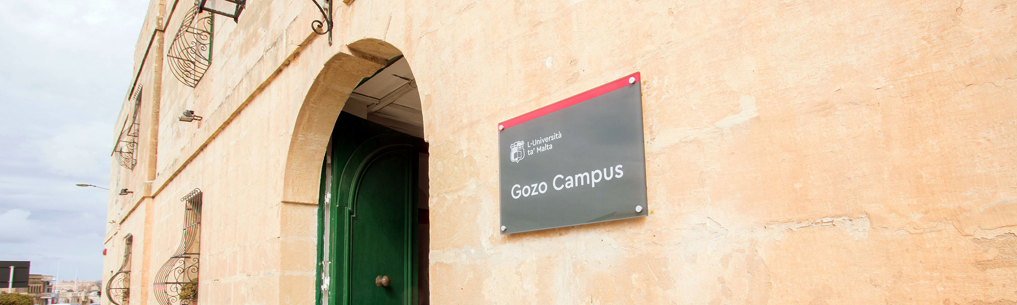 Entrance to the Gozo Campus showing the plaque on the outside