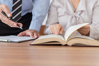 Lawyers having team meeting in law firm