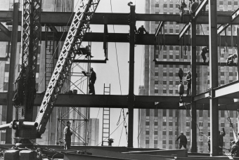 An old image of a skyscraper being constructed