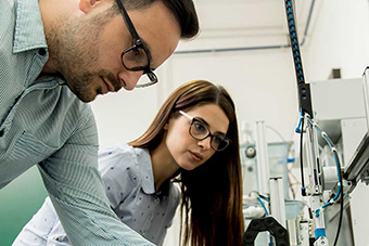 Two students working in the lab