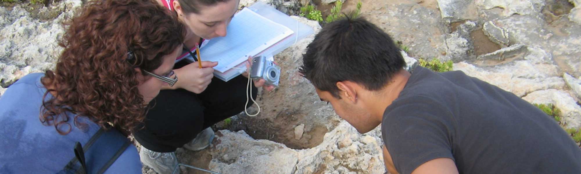 Three people doing fieldwork