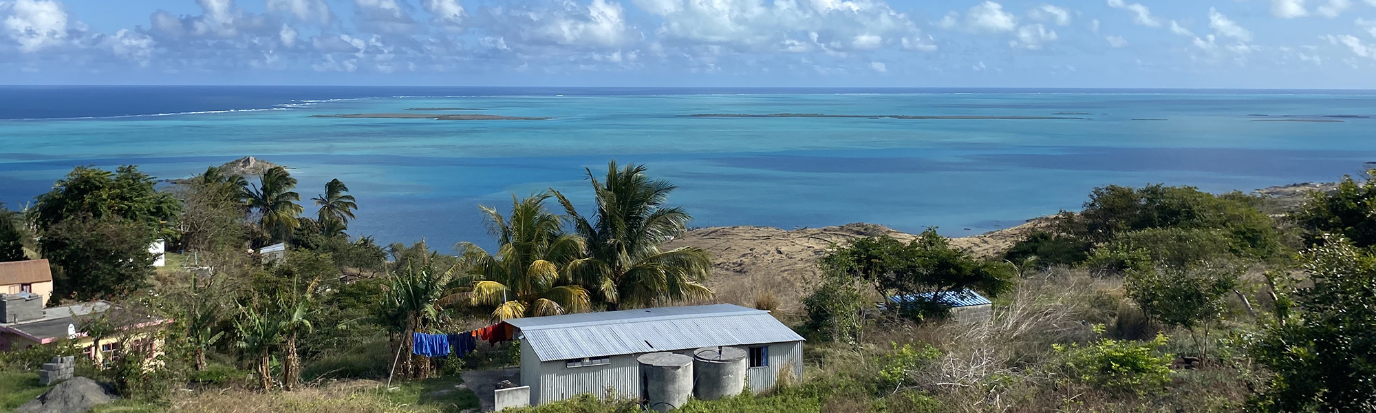 An island, the sea and the sky